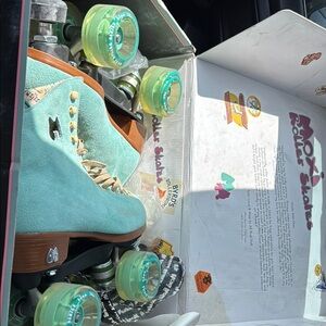 Aqua Suede Roller Skates with Lime Wheels